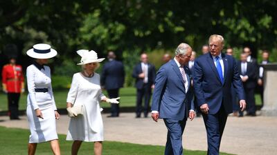 Britain's Camilla, Duchess of Cornwall (2L) and Britain's Prince Charles, Prince of Wales (2R) greet US President Donald Trump (R) and US First Lady Melania Trump on their arrival for a welcome ceremony at Buckingham Palace in central London on June 3, 2019, on the first day of their three-day State Visit to the UK. Britain rolled out the red carpet for US President Donald Trump on June 3 as he arrived in Britain for a state visit already overshadowed by his outspoken remarks on Brexit. / AFP / MANDEL NGAN