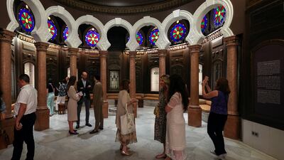 People tour the museum after its reopening. Reuters
