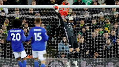 Leicester goalkeeper Kasper Schmeichel makes a save at Carrow Road. Reuters