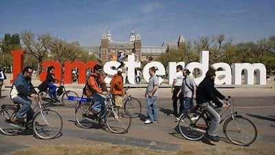 Renting a bike in Amsterdam makes commuting a pleasure. Ruud Taal / AFP