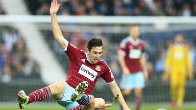 Stewart Downing of West Ham United is challenged by James Morrison of West Bromwich Albion during their FA Cup Fifth Round match at The Hawthorns on February 14, 2015 in West Bromwich, England. (Photo by Clive Mason/Getty Images)