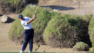 Ernie Els of South Africa plays his second shot on the 13th hole. Matthew Lewis / Getty Images