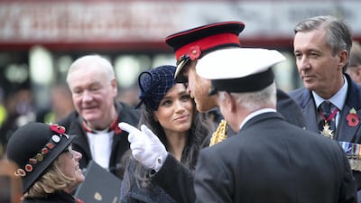 Prince Harry and Meghan meet veterans and soldiers as they attend the 91st Field of Remembrance at Westminster Abbey in November 2019. Getty Images