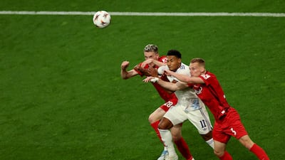 Aston Villa's Ollie Watkins, centre, is challenged by Freiburg's Philipp Lienhart, right, and Matthias Ginter in the Europa League final in Istanbul. AFP