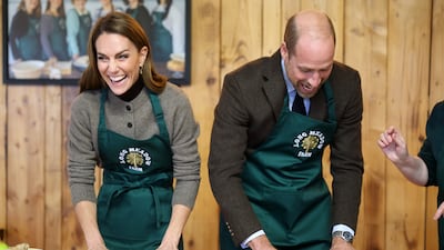Britain's Prince William and Kate, Princess of Wales, make a cake on a visit to the Long Meadow Cider premises in Craigavon, Northern Ireland. AP