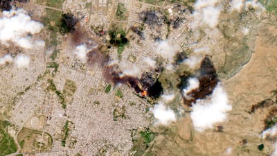 A satellite image shows smoke rising from Mekelle, Ethiopia, on October 20, 2021. Reuters