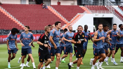 Manchester United players take part in a training session at Rajamangala National Stadium in Bangkok. AFP