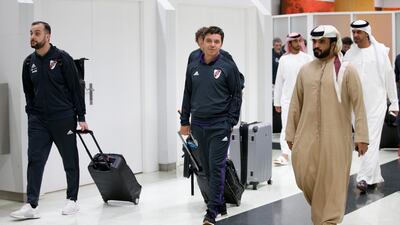 River Plate manager Marcelo Gallardo, centre, walks through Abu Dhabi Airport after arriving for the Fifa Club World Cup. EPA