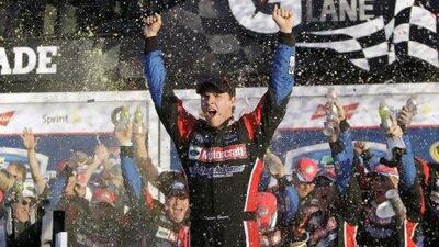 Trevor Bayne celebrates after winning the Daytona 500 at the Daytona International Speedway on Sunday. John Raoux / AP Photo