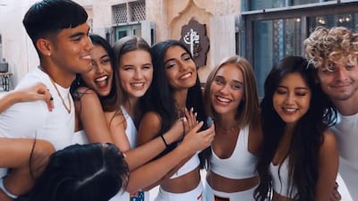 Fourth from left, Lebanese singer and dancer Nour ArdakanI stars in Now United's new video 'Habibi'. Instagram.