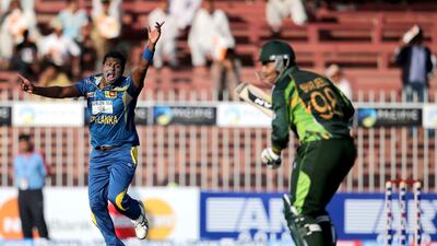 Sri Lanka’s Angelo Mathews, left, appeals a wicket against Pakistan in Sharjah on Wednesday. Francois Nel / Getty Images