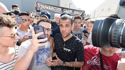 Juventus' new signing Dani Alves is surrounded by fans as he arrives at J Medical for a medical check up, Turin, Italy, 27 June 2016. EPA/ALESSANDRO DI MARCO