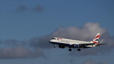 A man who was suffering a panic attack tried to open the door of British Airways flight while the plane was airborne but was foiled by other passengers. AFP