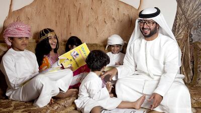 Saeed Ibrahim Al Mansoori with his children. Razan Alzayani / The National