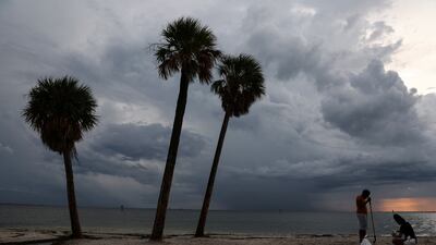 Florida residents fill sandbags as Hurricane Ian sped towards the state. Reuters
