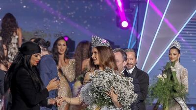 Maya Reaidy (C) reacts just after winning the Miss Lebanon 2018 beauty pageant. Photo / EPA