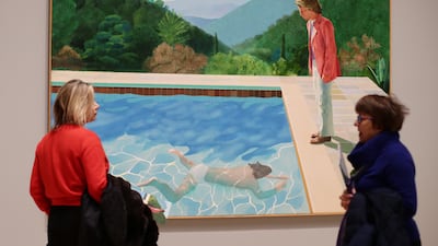 Hockney's Portrait of an Artist (Pool with Two Figures), set against a Californian landscape and completed in 1972, on show at Tate Britain, London, in 2017. Getty Images
