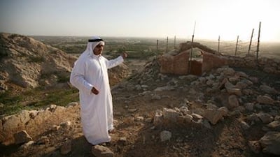 Above left, Hamad bin Seray points out and explains the significance of the area.