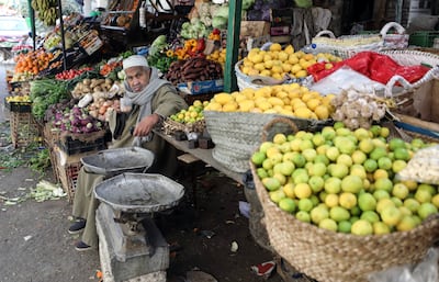 A fruit and vegetable seller at a market in Cairo, Egypt. EPA