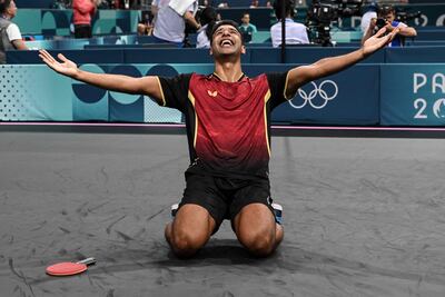 Egypt's Omar Assar celebrates after beating Kazakhstan's Kirill Gerassimenko. AFP