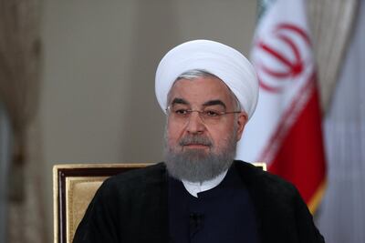 Protests against rising food prices and inflation put new pressure on President Hassan Rouhani as his signature nuclear deal with world powers remains in peril. Presidential office website/ EPA