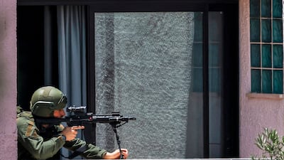 An Israeli soldier takes position near the border with Lebanon. AFP
