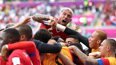 Keysher Fuller of Costa Rica celebrates with teammates after scoring their winner. Getty
