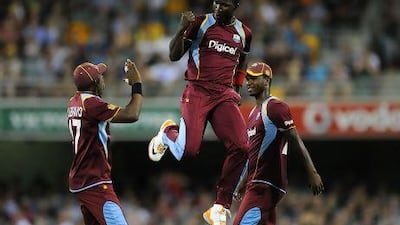 Darren Sammy, centre, has difficult examples to follow as captain of the West Indies. Matt Roberts / Getty Images