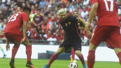 Lionel Messi in action against Liverpool. Will Oliver / EPA