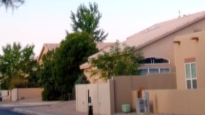 A hot-air balloon envelope falls from the sky near Unser and Central SW in Albuquerque, New Mexico. AP Photo