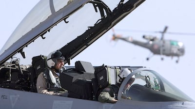 Mr Tata in the backseat of a US Navy Super Hornet plane at the Aero India 2007 air show in Bengaluru. AFP