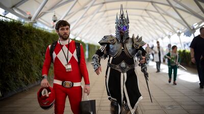Cosplayers dressed as a Power Ranger and Sauron from 'The Lord of the Rings'. EPA