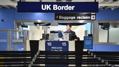 Passport control at an airport in the UK. PA