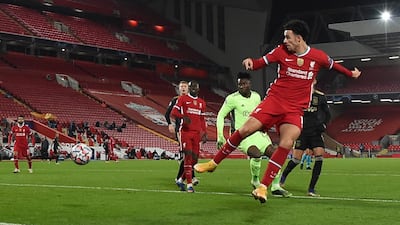 Curtis Jones scores the opening goal during the Champions League match between Liverpool and Ajax. EPA