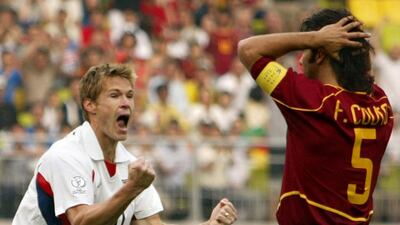 Brian McBride celebrates causing an own goal against Portugal at the 2002 World Cup. Shaun Best / Reuters / June 5, 2002