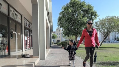 The community vibe in International City is a major draw for many families. Victor Besa / The National