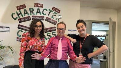 Teachers at Ranches Primary School - Andi Price, (C), Nerys Hughes, (L), and Emma Synnott, (R), wore pink to school on Thursdays before the Covid-19 pandemic. Courtesy: Andi Price