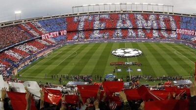 Atletico Madrid’s supporters cheer for thier team before the Uefa Champions League semi-final first leg match between Atletico Madrid and Bayern Munich played at the Vicente Calderon stadium, in Madrid, Spain, 27 April 2016. EPA/MARISCAL
