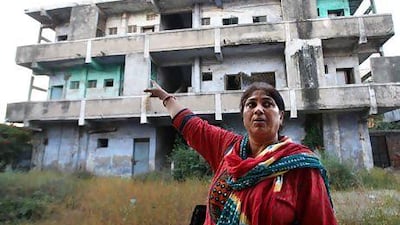 Rupa Dara Mody witness and victim showing her flat in Gulberg society in Ahmedabad city of Gujarat state in India. Rupa Dara Mody lost her son Ajar who was 13 years old at the time of th 2002 riots.