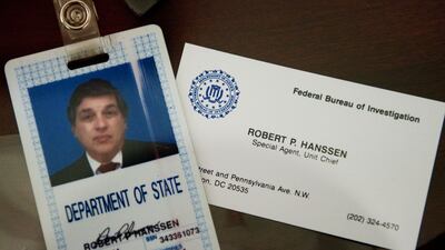 The ID and business card of former FBI agent Robert Hanssen on display at the FBI Academy in Quantico, Virginia. AFP