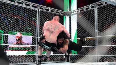 Roman Reigns spears Brock Lesnar during their Universal title match at the WWE Greatest Royal Rumble in Jeddah, Saudi Arabia. Courtesy WWE