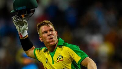 David Warner celebrates after reaching three figures in the first ODI in Mumbai. AFP