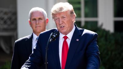 US President Donald J. Trump (R) delivers speech beside US Vice President Mike Pence (L). EPA