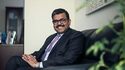 Promoth Manghat, chief executive of UAE Exchange, has inked a deal with San Francisco-based technology company Ripple to adopt blockchain technology. Mona Al Marzooqi / The National