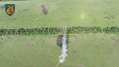 A Ukrainian unit breaches mine defences as part of the southern counter-offensive near Hulyaipole in the Zaporizhzhia region. Reuters