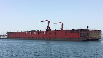 Abu Dhabi Ship Building's new floating drydock at Mina Zayed is 180 metres long, 30 metres wide and employs robots for hull work. Courtesy : ADSB
