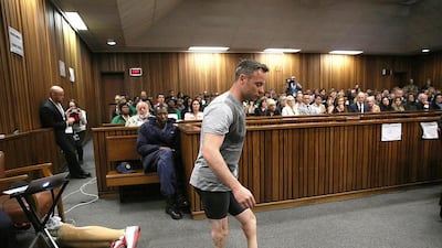 Paralympic gold medalist Oscar Pistorius walks across the courtroom without his prosthetic legs on the third day of the resentencing hearing for the 2013 murder of his girlfriend Reeva Steenkamp, at Pretoria High Court, South Africa on June 15, 2016. Siphiwe Sibeko/Reuters