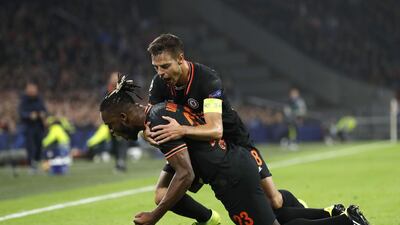 Michy Batshuayi celebrates scoring Chelsea's goal against Ajax with Cesar Azpilicueta. EPA