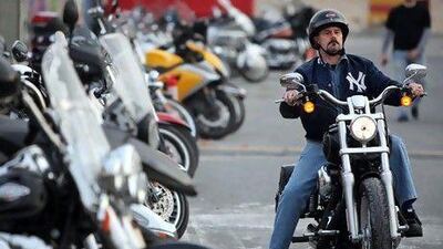 Motorcycle enthusiasts are shying away from the luxury end of the market, while sales of commuter bikes have increased. Amy Leang / The National