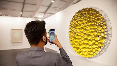 At this year's India Art Fair, Berlin gallery neugerriemschneider is presenting a work by Olafur Eliasson comprised of glass spheres that change colour as visitors walk around them. Courtesy India Art Fair 2020